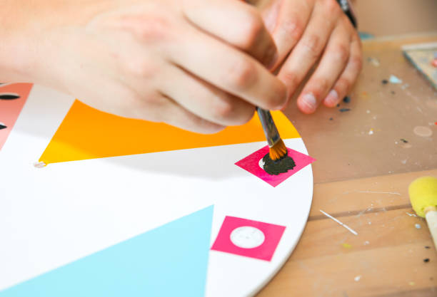 istock Real work studio of the painter. Man is creating picture. Artist concept. Creative atmosphere. Paint brushes. 1192303238