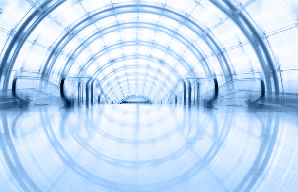 istock Tunnel walkway in a modern office building 1192304011
