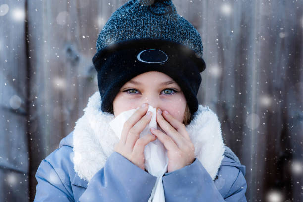 istock beautiful sick girl in winter 1192306499