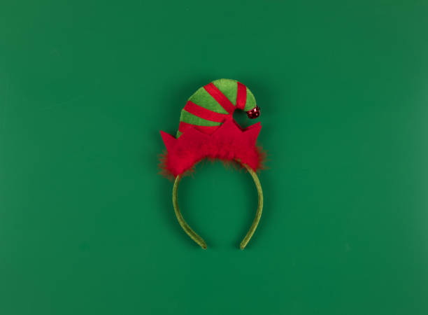 istock Santa Claus headband isolated on green background 1192308458