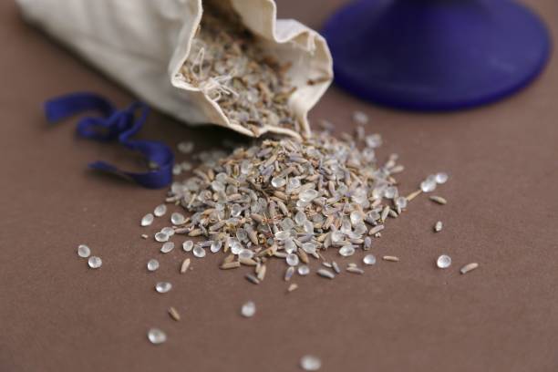 istock Lavender seeds in handmade fabric bag and bath salt on the  table 1192309331