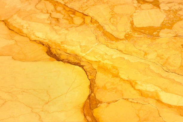 istock Textured background. Yellow, brown and beige background colors with abstract lines pattern. Waves. It can be used for interior-exterior home decoration and ceramic tile surface, Wallpaper. 1192309483