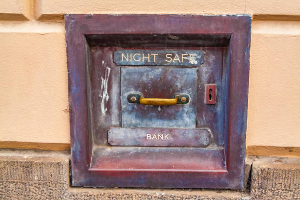 historic bronze bank night safe deposit box cityscape in the famous 19th century gold mining town of ballarat, victoria - night deposit box imagens e fotografias de stock