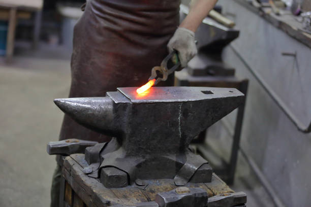 istock The process of manufacturing a craft product in a forge 1192311831