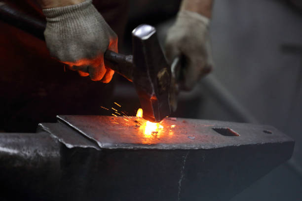 istock The process of manufacturing a craft product in a forge 1192311832