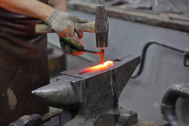 istock The process of manufacturing a craft product in a forge 1192311873