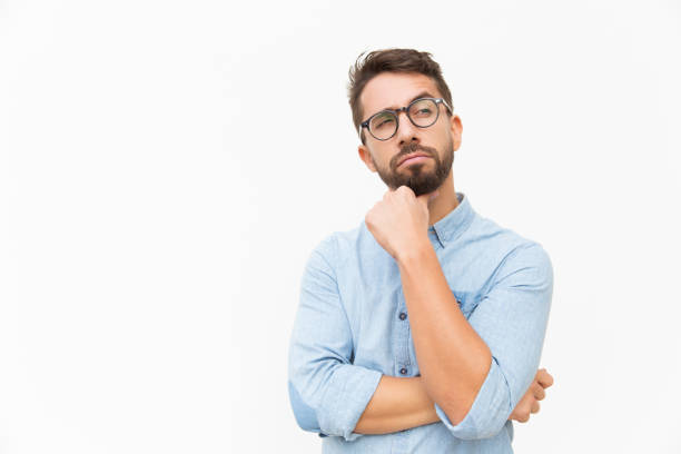 istock Pensive male customer looking away 1192312217