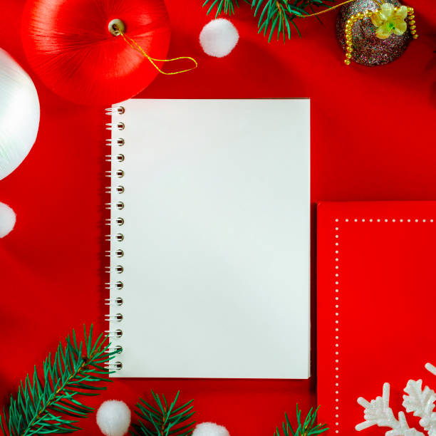 istock Frame of Christmas decoration on red background top view 1192313337