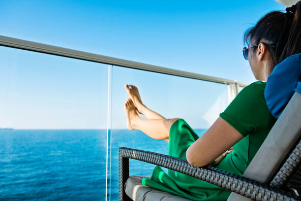 Young woman relaxing on cruise.