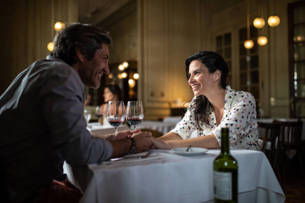 istock Celebrating their anniversary along red wine 1192316442