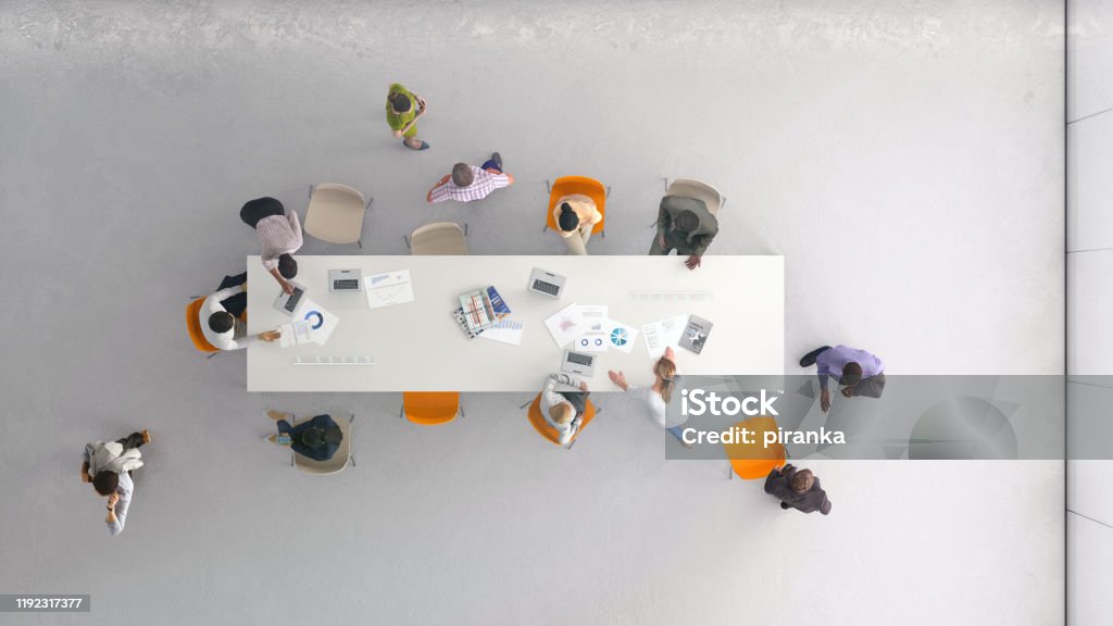 High angle view of people at work Overhead view of a group of people working in the office. All elements in the scene are 3D High Angle View Stock Photo