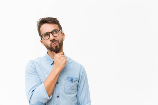 istock Thoughtful male customer thinking hard 1192317669