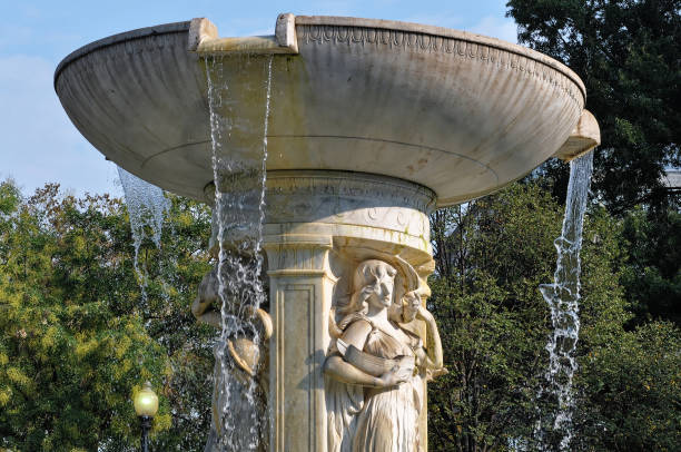 istock Beautiful fountain in a park 1192318917