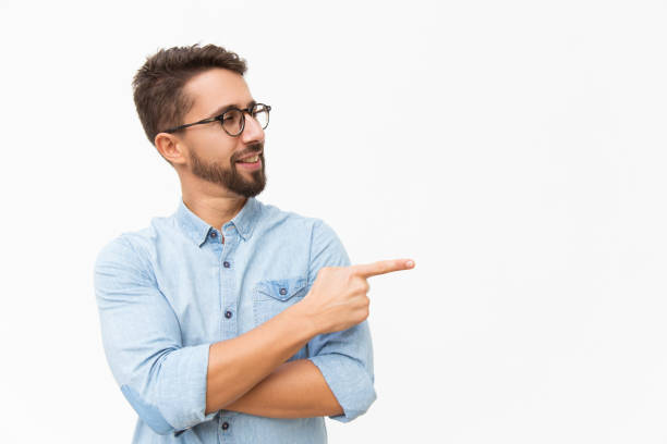 istock Positive male customer presenting new product 1192319639