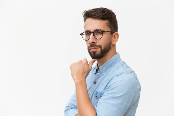 istock Content satisfied male customer touching chin 1192324144