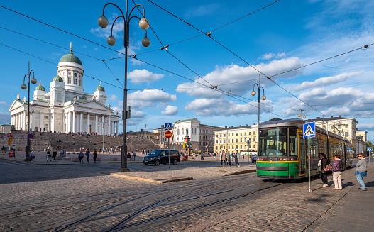 August 4, 2019 - Helskinki, Finland: tourists in front of Helsinki Cathedral (St Nicholas' Church) on Senate Square, Helsinki, Finland