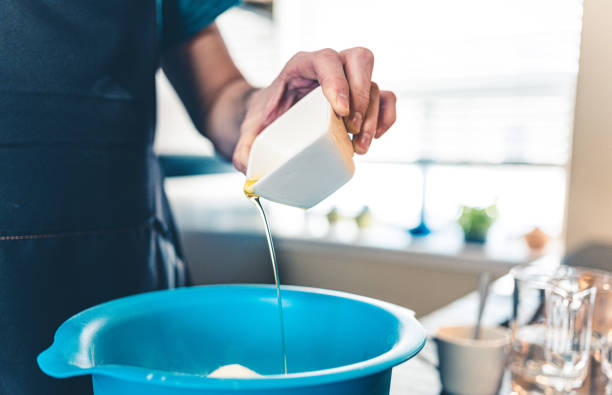 istock Hands of Man making pizza 1192331170