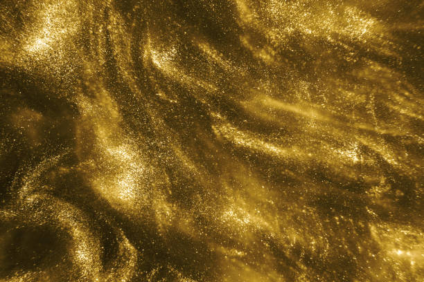istock gold glitter shimmering magic bokeh background 1192332464