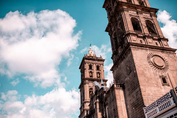 The architecture of Puebla. Photo of the clear sky and old church.