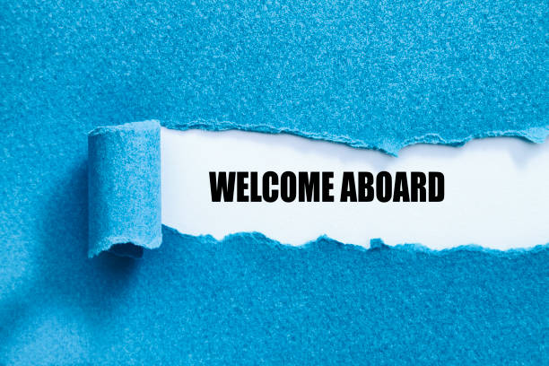 WELCOME ABOARD WELCOME ABOARD written under torn paper. aboard stock pictures, royalty-free photos & images