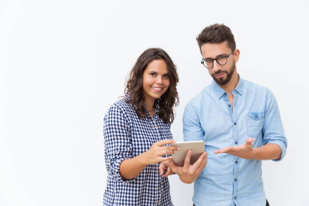 istock Cheerful couple with tablet 1192335516