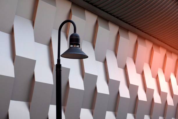 istock vintage street lamp post with modern wall decoration 1192336094