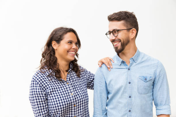 istock Happy satisfied couple chatting and laughing 1192346543