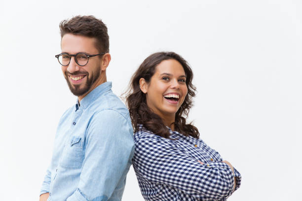 istock Happy cheerful couple leaning on each other 1192346806