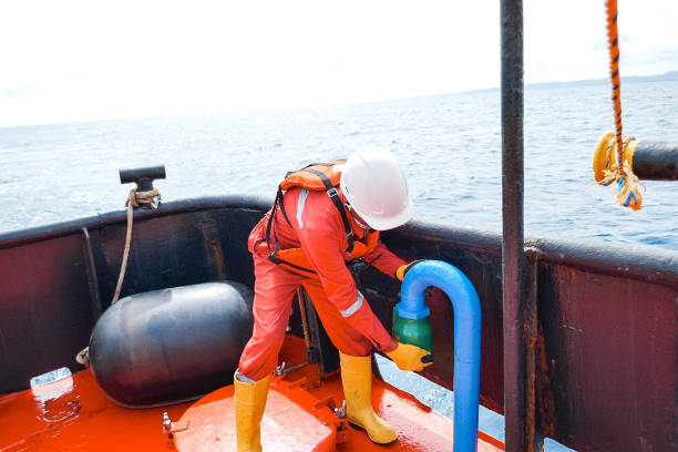 istock Sailor doing repairs on industrial ship 1192347037