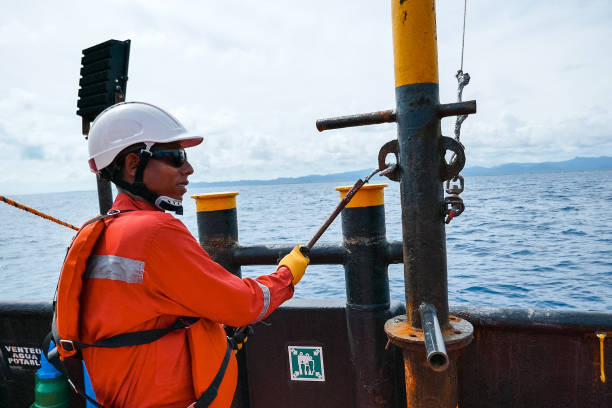 istock Sailor doing repairs on industrial ship 1192347040