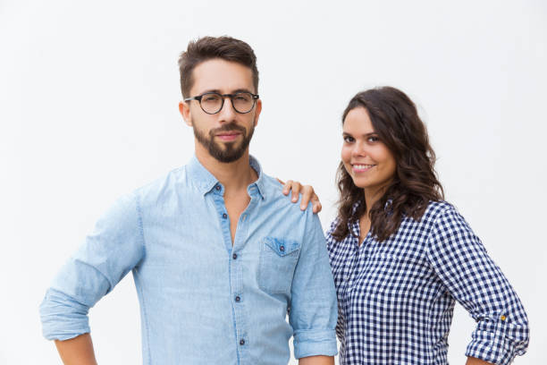 istock Friendly attractive couple posing together 1192350375