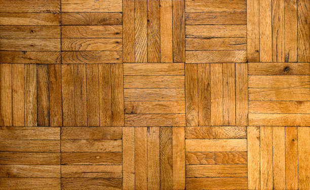 istock Old wooden parquet floor background 1192354149
