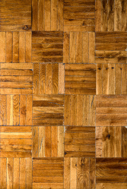 istock Old wooden parquet floor background 1192355352