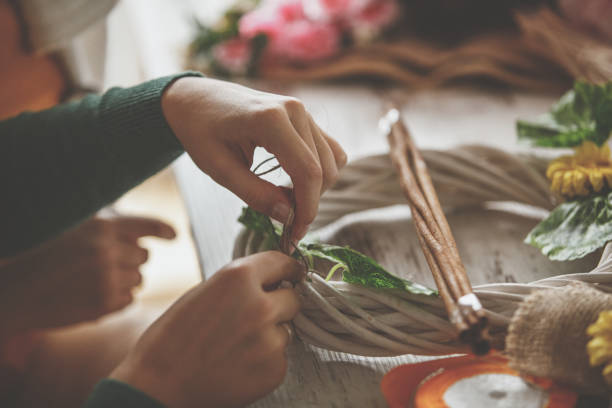 istock Tying decorations on a flower arrangements 1192355668