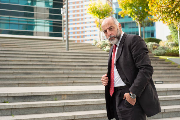 istock Confident businessman standing on street 1192355864