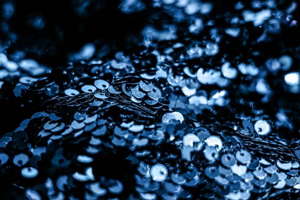 istock Festive glamourous background made of two-sided sequins. 1192360461