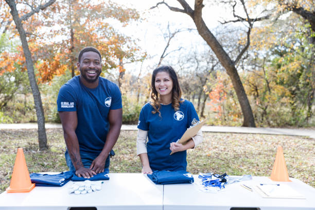 istock Couple volunteering during community cleanup event 1192366439