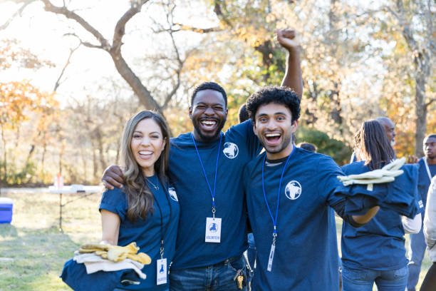 istock Diverse friends volunteer at cleanup event 1192366475
