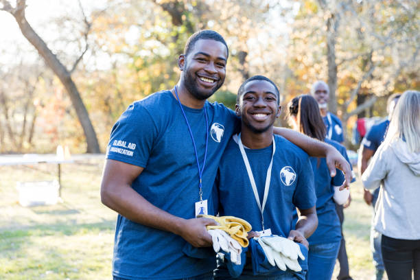 Father and son volunteer to help cleanup their community