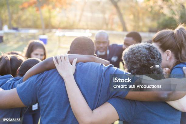 Unified Team Of Volunteers Stock Photo - Download Image Now - Community, Volunteer, Community Outreach