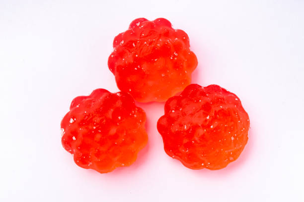 Red jelly sweet sugar candies on white background