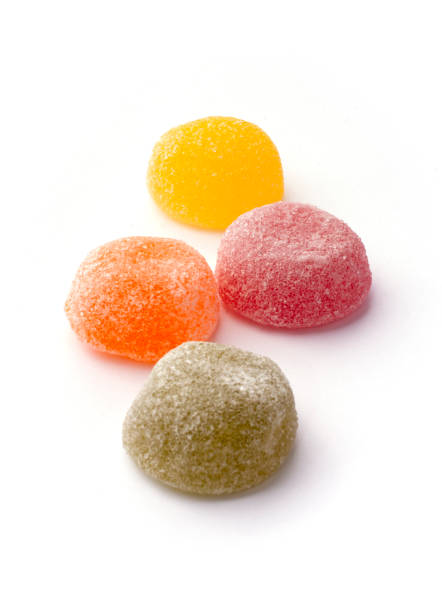 Colored jelly sweet sugar candies on white background