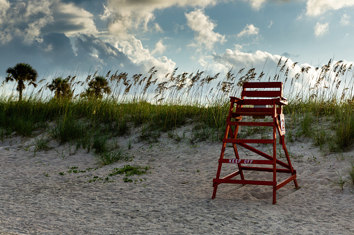 Tall red life guard stand on the beaches of North East Florida.