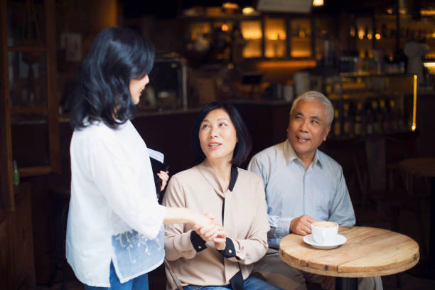 istock Elderly Taiwanese people in cafe bar 1192375477