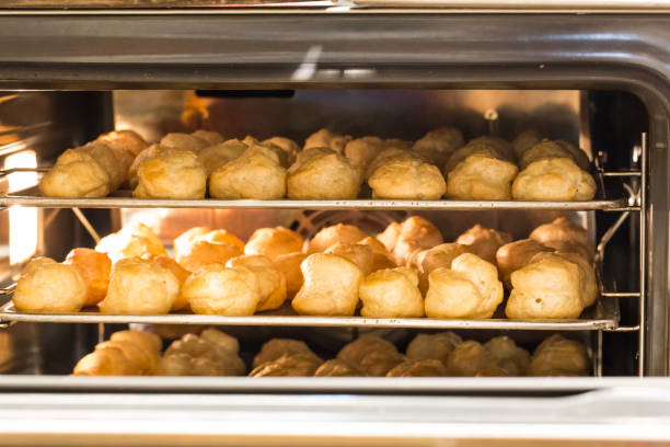 istock Baking choux cream in the oven. 1192381662