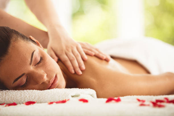 istock Woman receiving shoulder massage at spa 1192383464