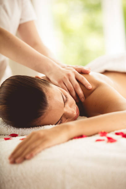 istock Woman receiving relaxing shoulder massage at spa 1192383471
