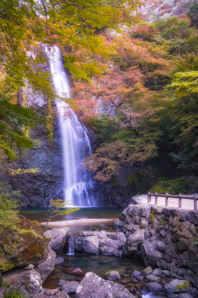 istock Minoo Waterfall in Colorful Autumn Season with Red Maple Leaf Fall Foliage. 1192384276