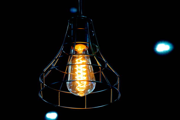 istock Glowing light bulbs in the loft style 1192384400