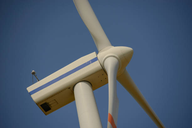 istock Wind turbine at sunny day 1192387921